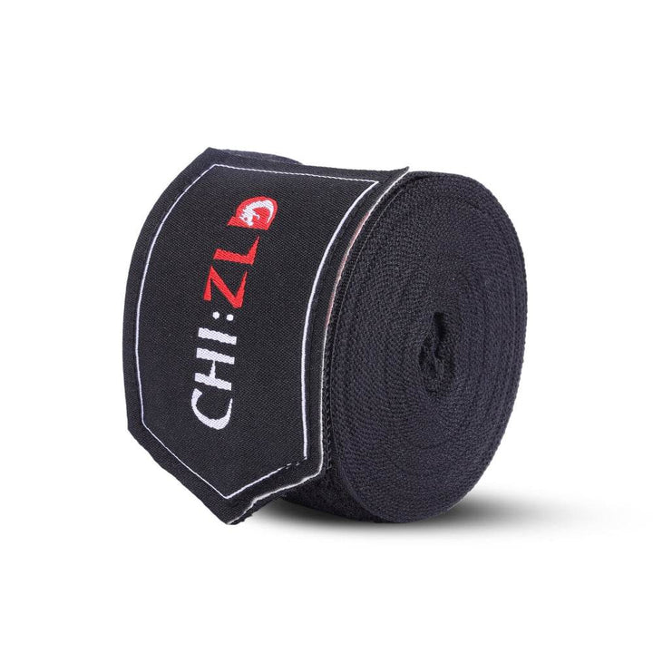 Upright roll with visible logo patch wrapped around core of bright black handwrap.