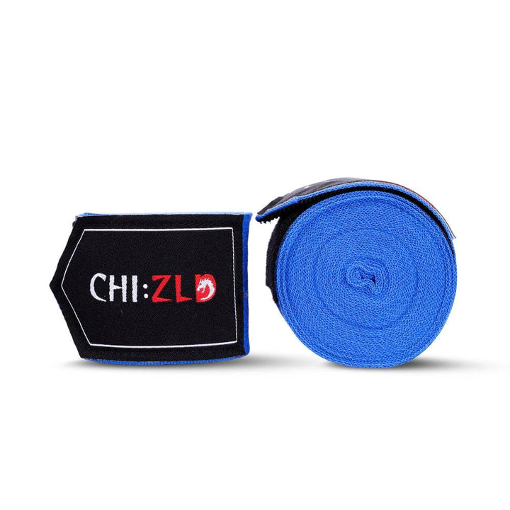 Two 4.5 m CHIZLD Impact handwraps: one neatly rolled royal-blue wrap, one folded section displaying black patch with white “CHI:” and red “ZLD” logo framed by blue edging.