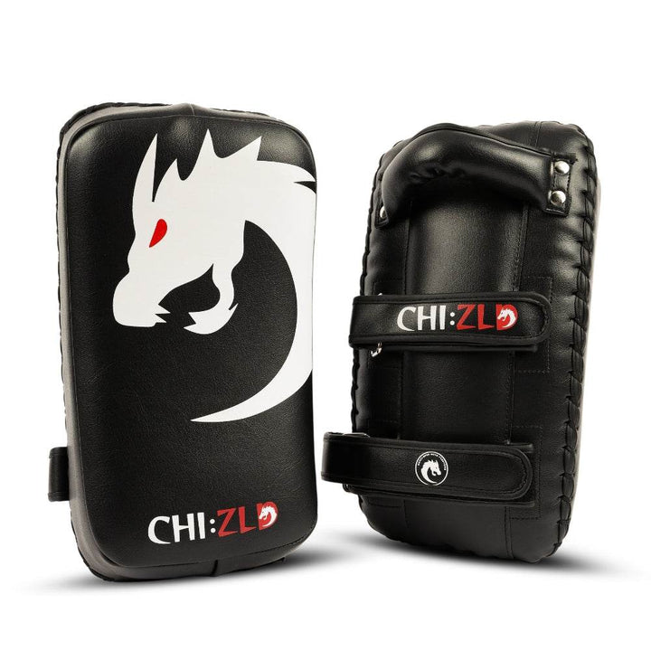 Pair in identical pose as #2, emphasizing stitched perimeter lacing and thick shock-absorbing core.