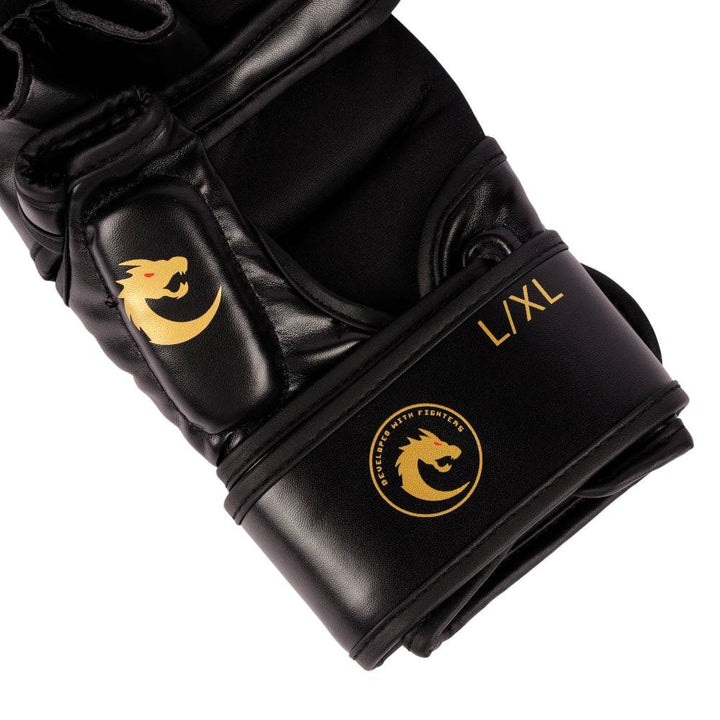 Close-up of wrist cinch highlighting circular “Developed with Fighters” dragon emblem and size “L/XL” indicator.