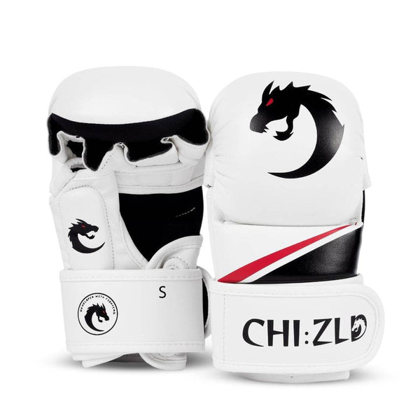 Front and rear view of paired white MMA-style sparring gloves with padded knuckle shell, black dragon-head logo, and diagonal red/black accent stripe.