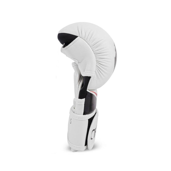 Narrow side profile of a single glove illustrating pre-curved fist shape and compact striking surface.