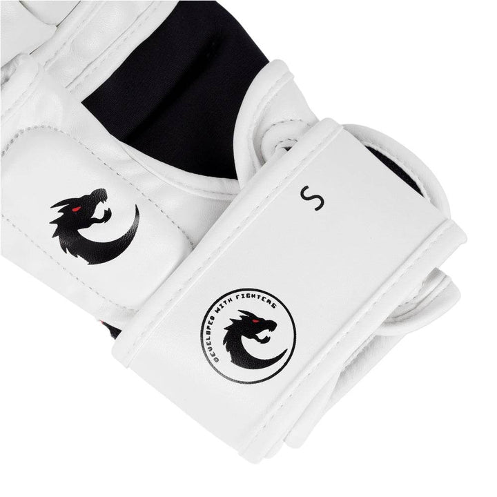 Close-up of wrist cinch highlighting circular “Developed with Fighters” dragon emblem and size “S” indicator.