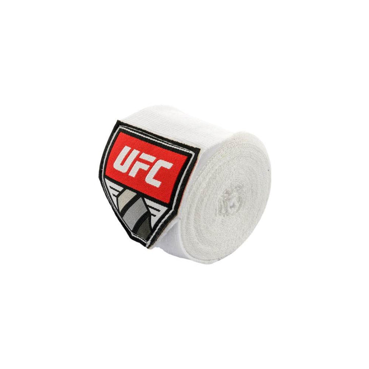 One white roll angled to highlight the bright fabric and stitched label patch.