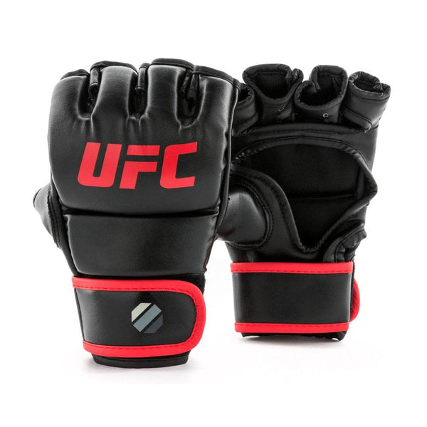 Pair overview – Front-and-back view of gloves: matte-black synthetic leather with bold red “UFC” on knuckles; open-palm glove shows padded thumb cradle and black-nylon interior; wrist straps edged in bright red with tonal-octagon icon.