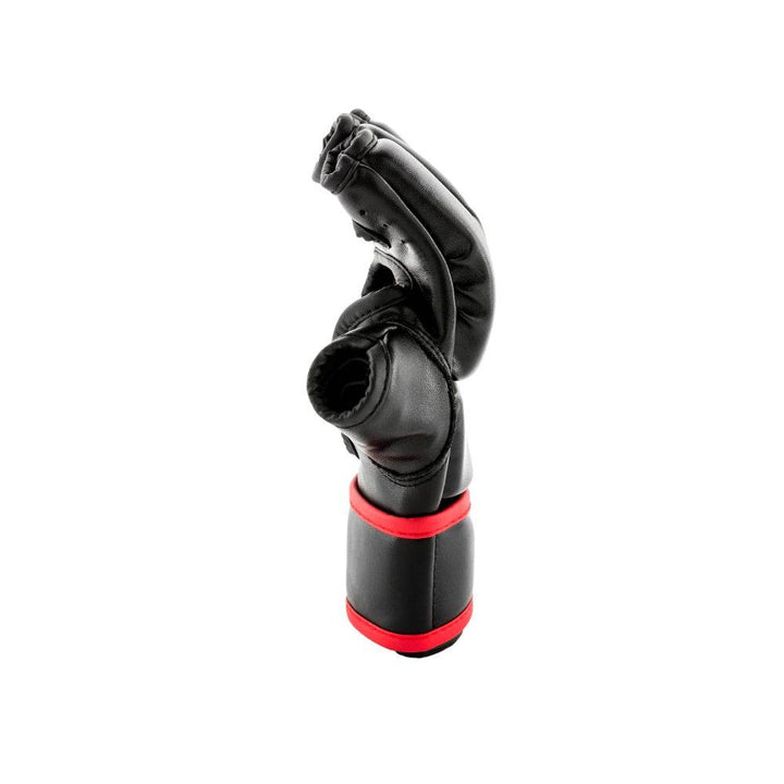 Side profile – thumb edge – Slim view displaying sculpted thumb protection, layered fist padding and tall wrist cuff encircled by red trim.