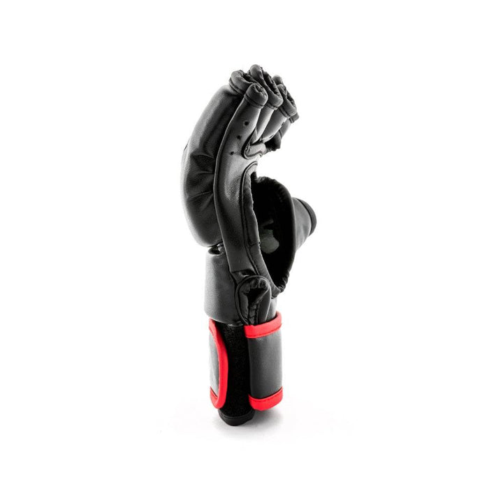 Side profile – outer edge – Opposite angle exposing tapered fist shape and ergonomic curve from wrist to fingers.
