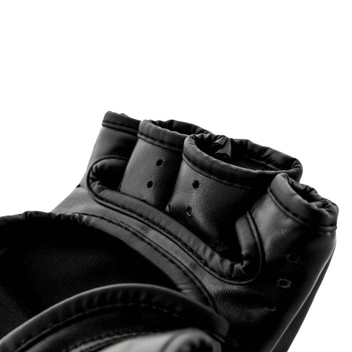 Finger-vent detail – Close-up of perforated finger channels and soft rolled edges for ventilation and comfort.