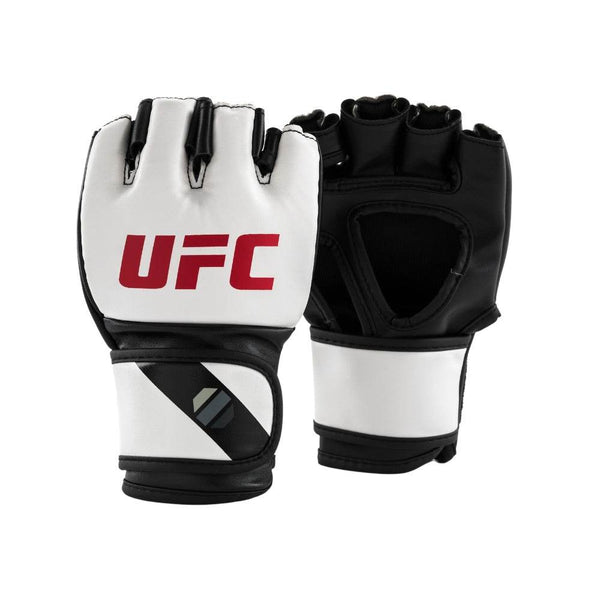 Front-and-back view: white synthetic-leather knuckle panels with bold red “UFC,” contrasting black palm side with large teardrop cut-out; hook-and-loop wrist straps feature diagonal black graphic and tonal-octagon icon.