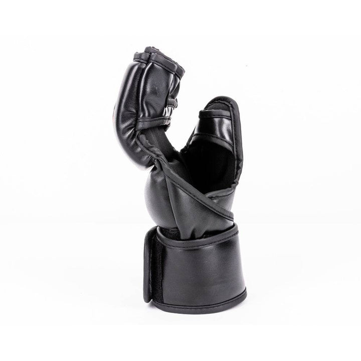 Side profile – outer edge – Opposite angle exposing contoured exterior thumb seam, tapered fist shape and secure hook-and-loop cuff wrap.