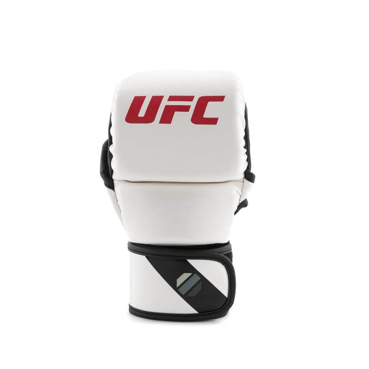 Single glove – knuckle side – Centered view of one glove’s square knuckle pad bearing red “UFC”, smooth white mid-segment and black/white hook-and-loop wrist strap featuring tonal octagon.