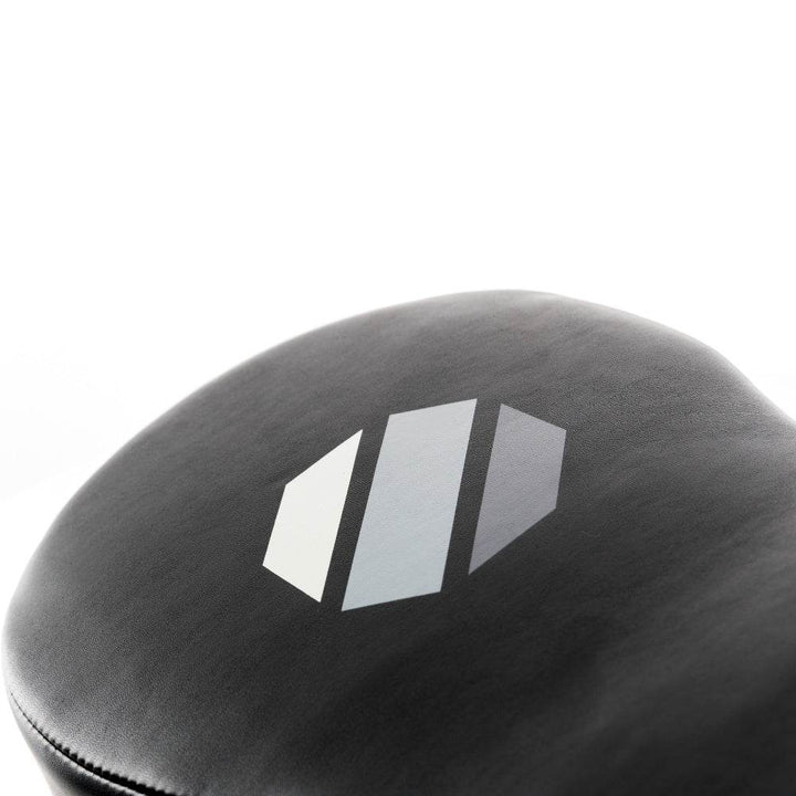 Target logo close-up – Detail of printed grey octagon on subtly curved black striking pad.