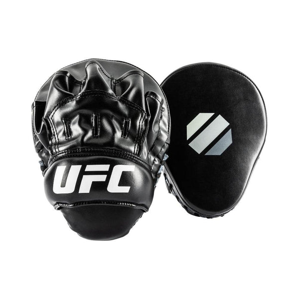Pair overview – Two teardrop-shaped mitts: front/striking pad shows matte-black face with pale grey octagon logo; glove side displays glossy black finger channels and white “UFC” script across lower padded ridge.