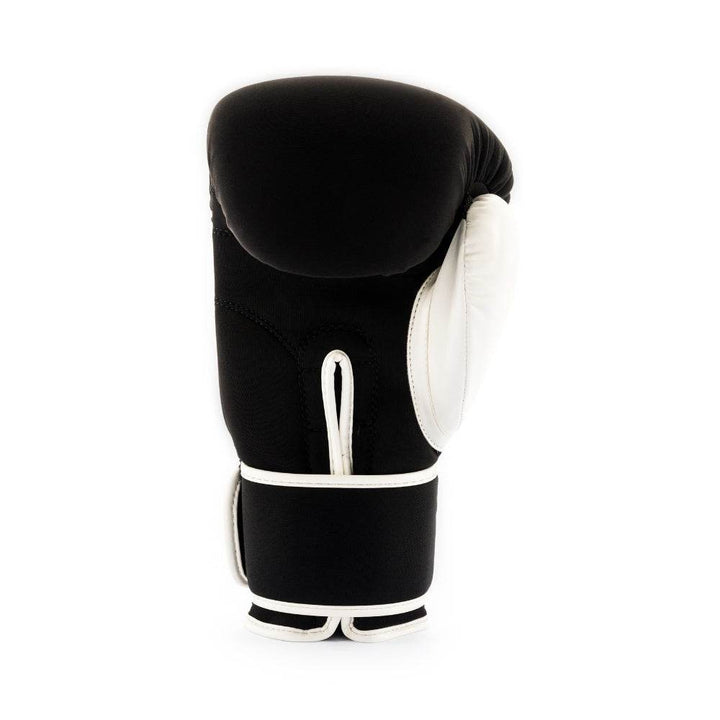 Rear (palm-side) view of the glove highlighting the ventilated black neoprene backhand, white thumb panel, and integrated pull tab on the wrist wrap.