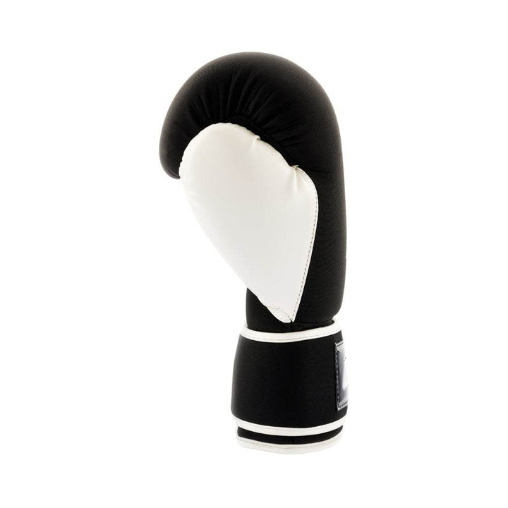 Left-side profile showing the smooth white synthetic-leather palm and contoured thumb support against the black outer shell.