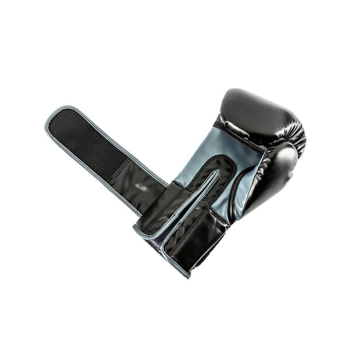 Glove laid palm-up with the hook-and-loop strap fully unfurled, revealing the inner cuff lining and attachment area.
