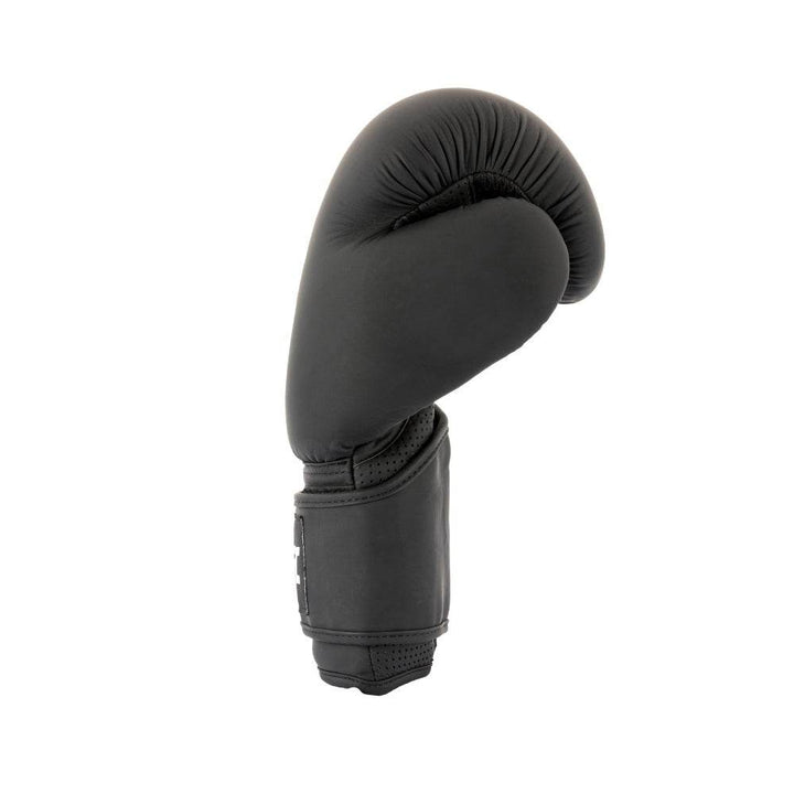 Macro of thumb sheath: padded outer, breathable perforations and double-row stitching at stress points.