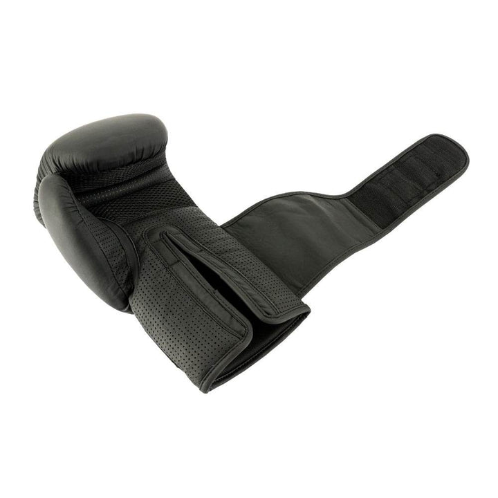  Glove palm-down, long black strap unfurled to show hook patch and soft loop interior for tight closure.