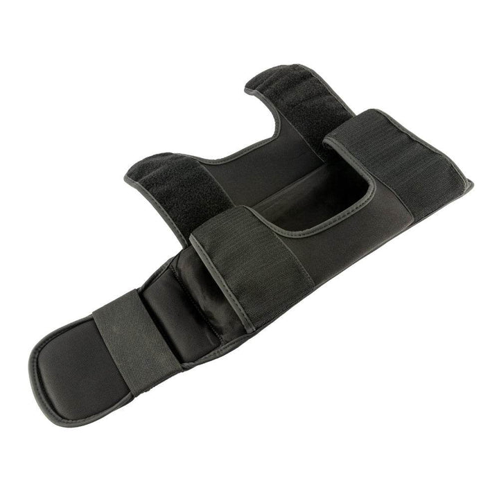 Rear layout – straps open: One shin guard opened flat to display the full interior, showing calf cut-out, two wide hook-and-loop closure bands, and padded instep section.
