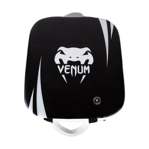 Front view of black Venum Giant Kick Shield with bold white Venum snakehead logo and curved design.