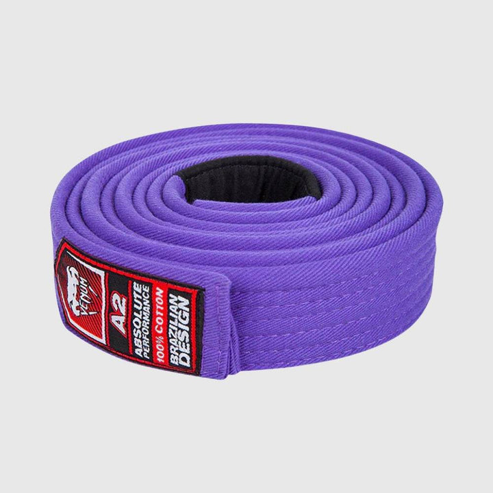 Rolled Venum BJJ purple belt with red A2 label and black patch, emphasizing Brazilian design and premium cotton quality.