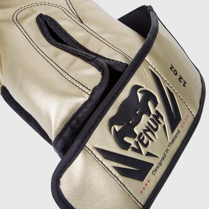Detailed side view showing loop stitching, contour padding, and the embossed Venum logo on the strap.