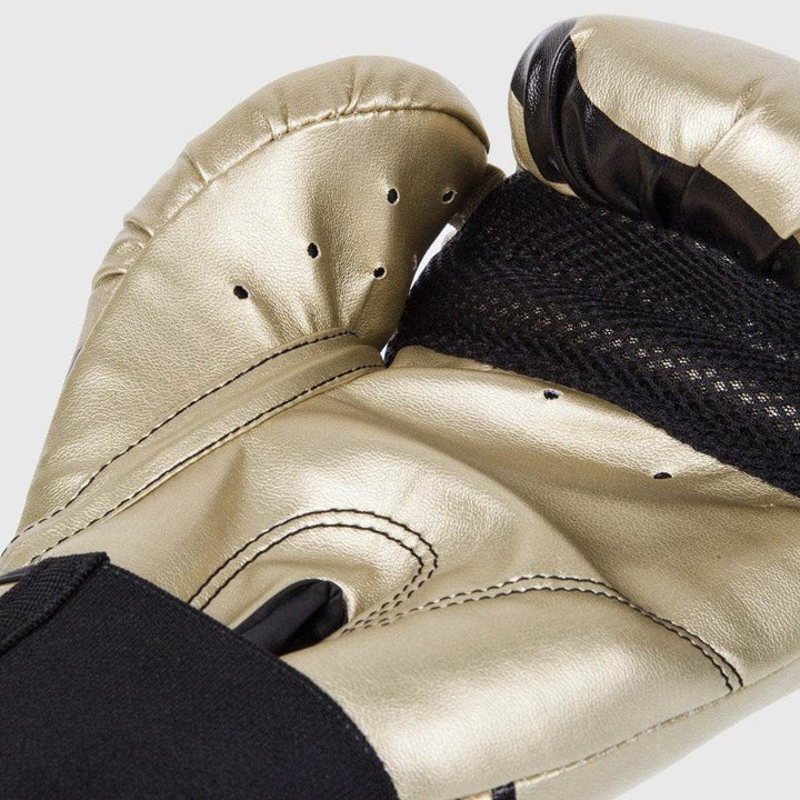Palm-side close-up of the glove displaying ventilation holes, black mesh panel, and padded inner surface for comfort and airflow.