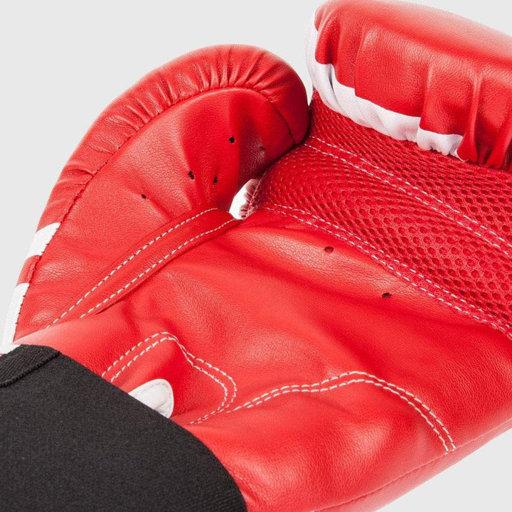 Close-up of the palm area of the red/white Venum Challenger 2.0 boxing glove, highlighting breathable mesh paneling, finger holes, and detailed white stitching on the synthetic leather.