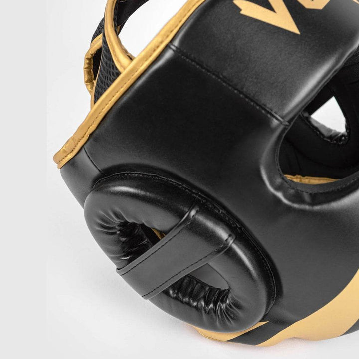 Close-up side view of the Venum headgear focusing on padded ear coverage and strap detailing.