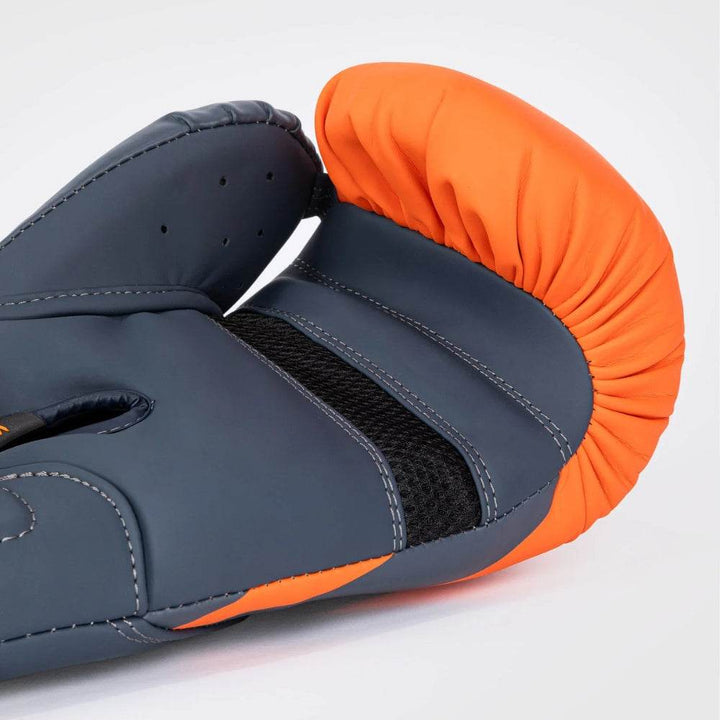 Detailed image showing the black mesh ventilation panel and stitching along the palm and thumb.