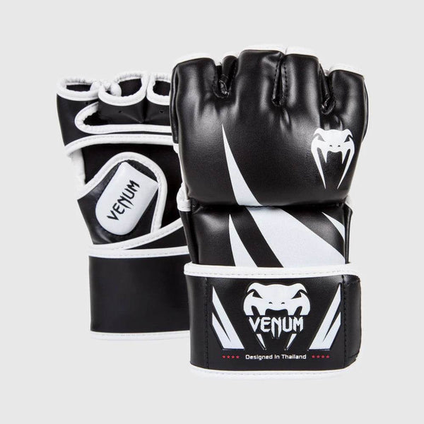 Venum Challenger MMA gloves in black and white with fang pattern and Venum logo on wrist.