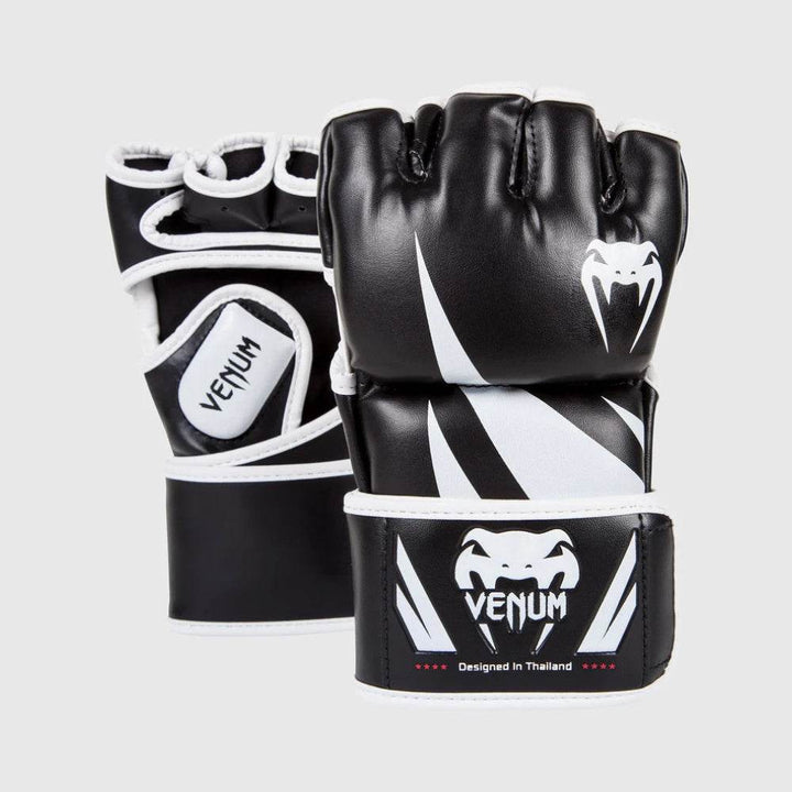 Venum Challenger MMA gloves in black and white with fang pattern and Venum logo on wrist.