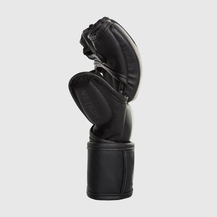 Black-on-black thumb protection with subtle logo details.