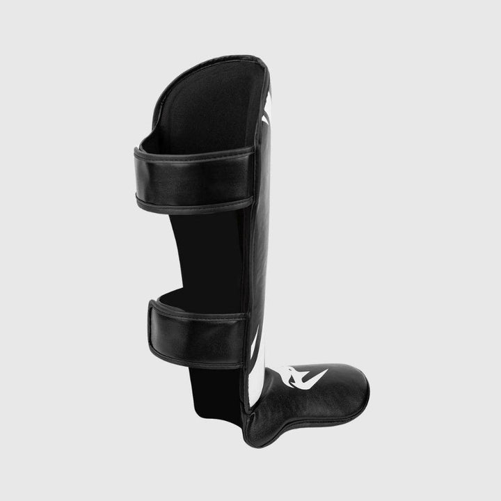 Back view of the Venum Challenger Shinguard featuring dual wide hook-and-loop straps for secure fastening and ergonomic comfort.