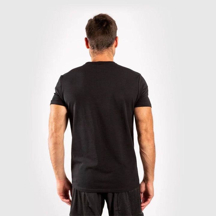 Back view of the Venum classic black t-shirt showing a plain design with no graphic.