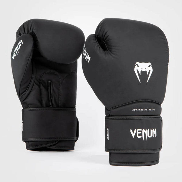 Paired front and angled side view showing the curved glove silhouette with white logo detailing and padded thumb area.