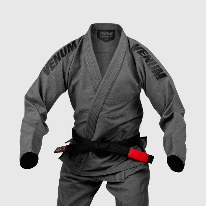 Grey Venum Contender Evo BJJ Gi on a mannequin with arms bent and black belt tied.