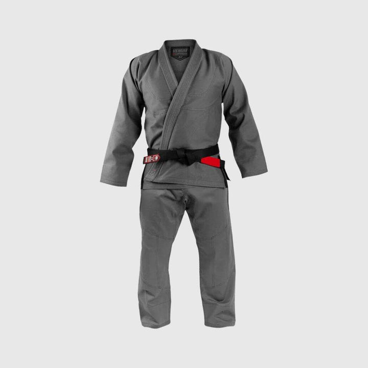  Full-body front view of the grey Gi, belt included.