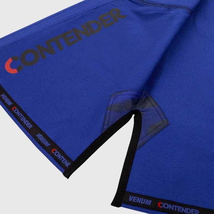 View of the inner hem of the gi jacket sleeve showing “CONTENDER” branding and internal reinforcement tape.