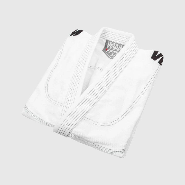 White gi jacket folded to highlight collar symmetry and detail.