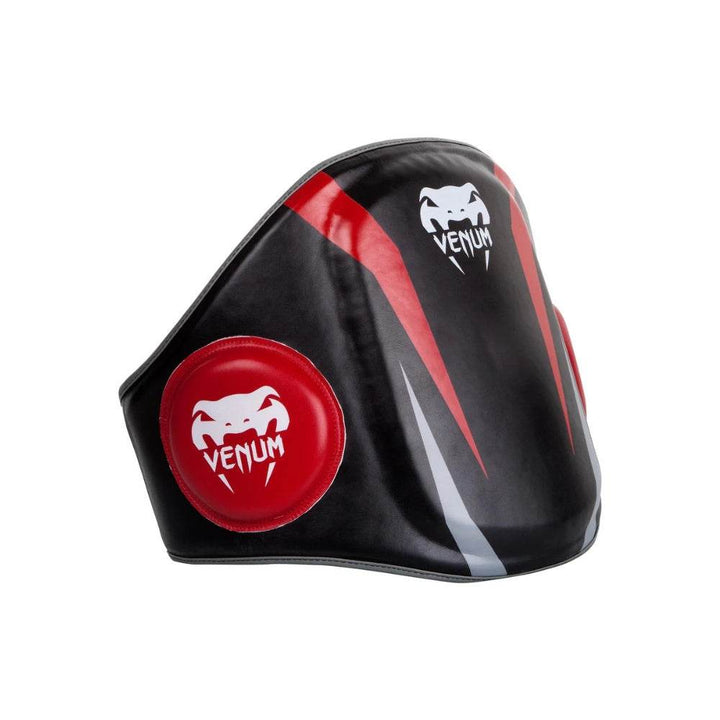 Angled side view of the Venum Elite Belly Protector highlighting the padded red side targets with Venum branding.