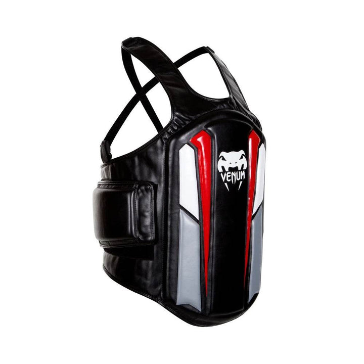 Side perspective of the Venum Elite Body Protector showing multilayer padding and the ergonomic design for upper-body coverage.