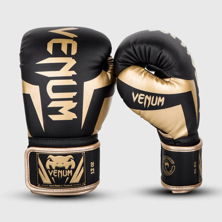 Front and thumb view showing gold text on black glove with 12 oz marking.