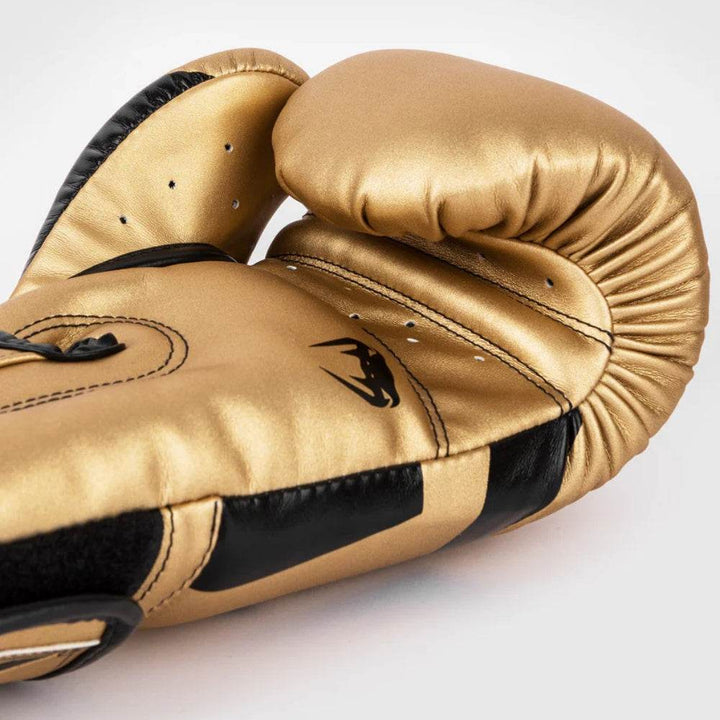 Palm-facing angle of the glove with ventilated holes and tight stitching on the ergonomic grip zone, designed for comfort and airflow.