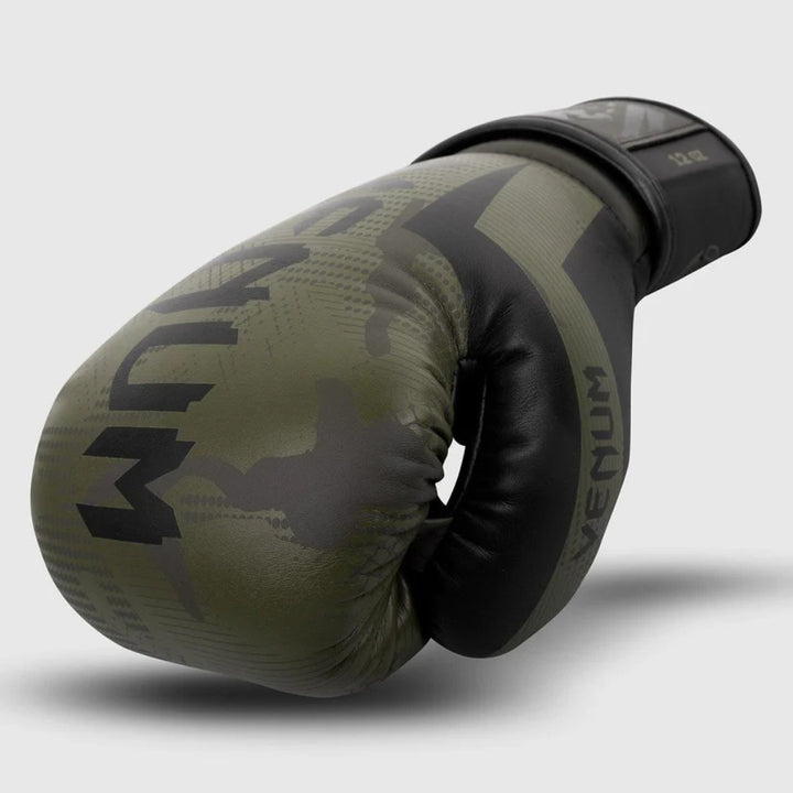 Khaki Camo glove resting on its side to show the camo design, curvature, and stitched segments.