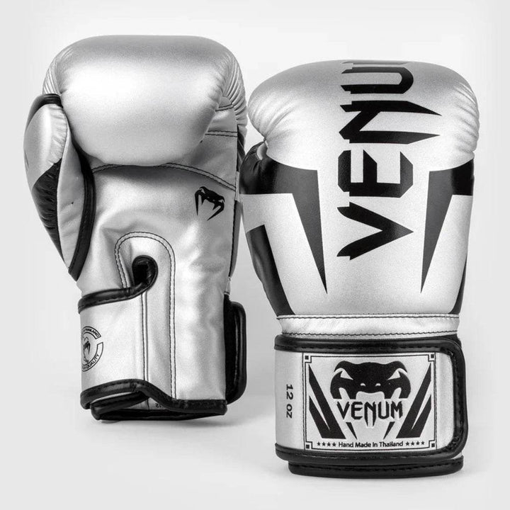 One glove showing the outer knuckle design and the other displaying the inner palm and thumb area, revealing breathability perforations and curved ergonomic design.