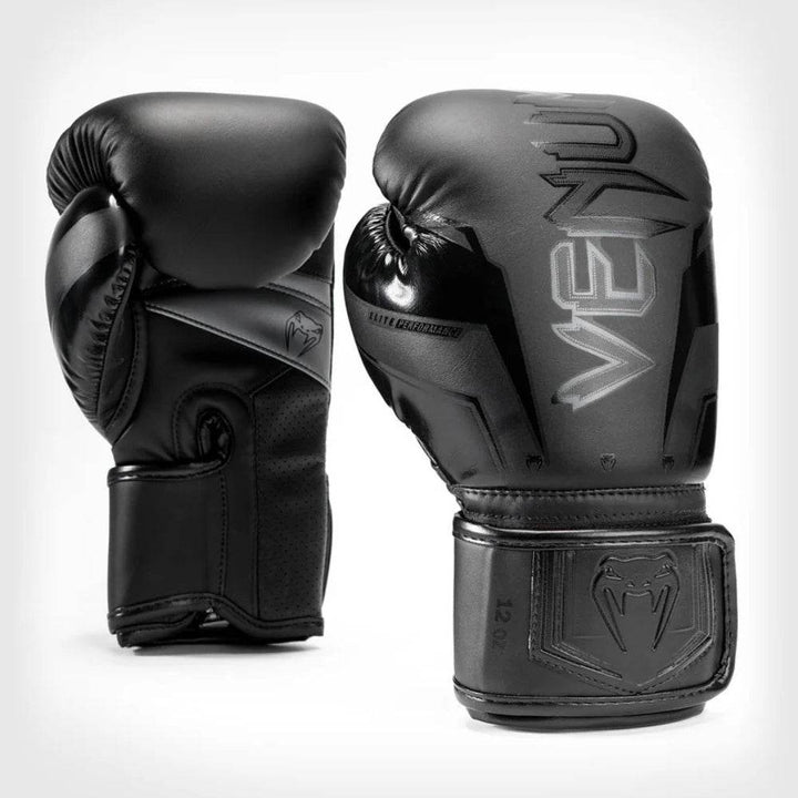 Matte all-black Elite Evo gloves front & side, tonal black “VENUM” logo visible.