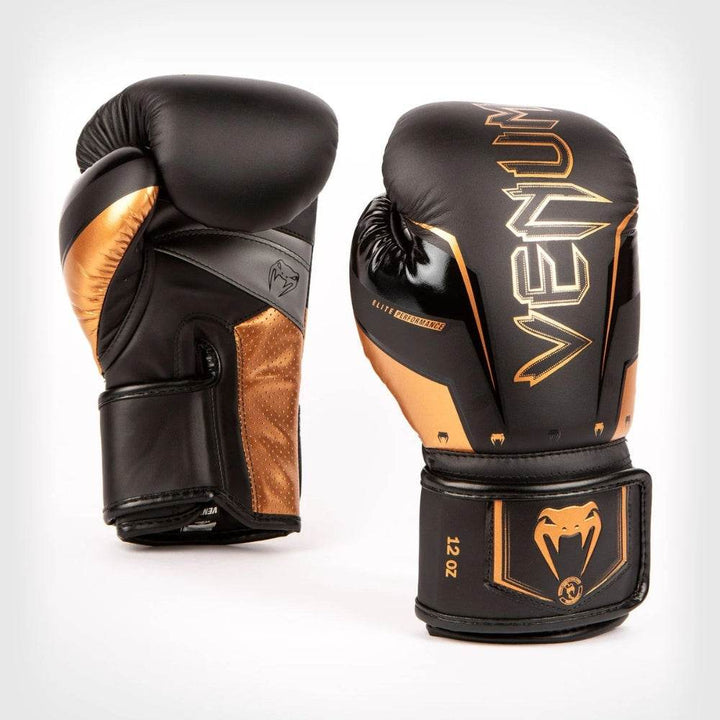 Front angled view of Venum Elite Evo gloves in matte black with bronze highlights and logo.