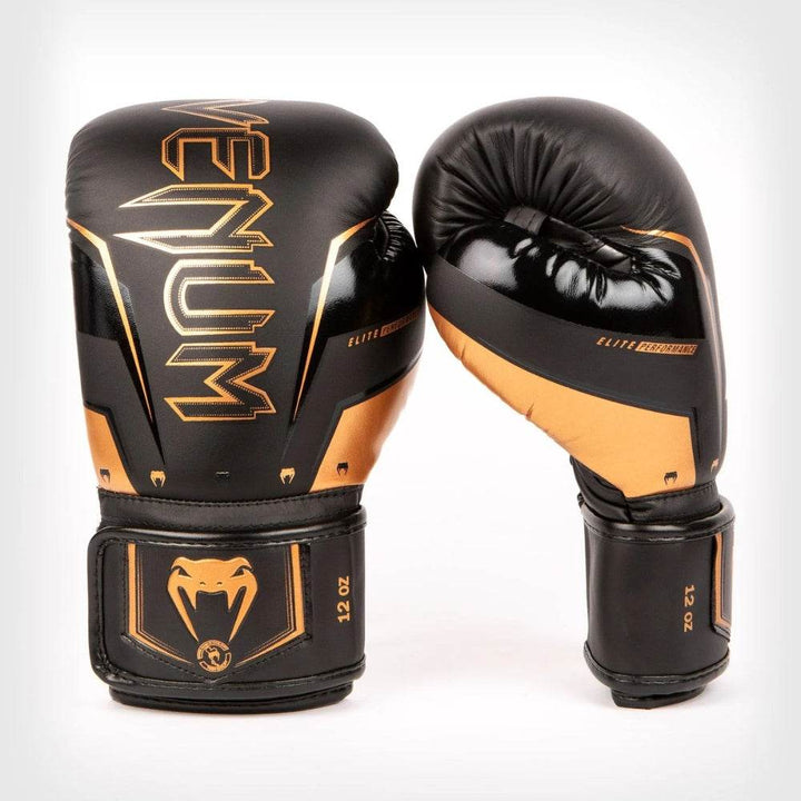 Front & side view of Venum Elite Evo gloves in matte black with bronze highlights and logo.