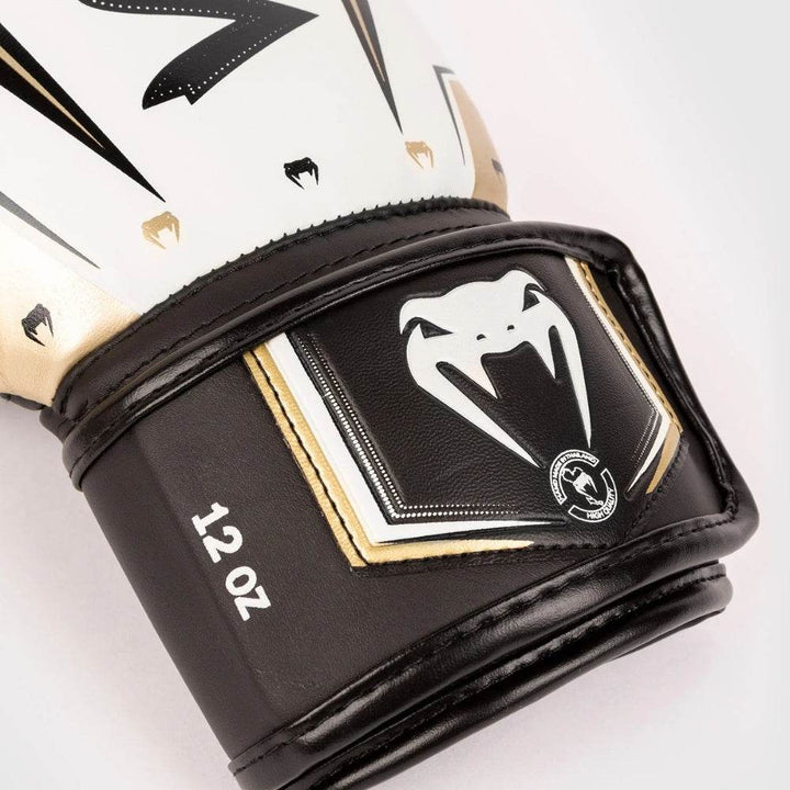 Close-up of wrist patch with gold snake-head logo and “Hand Made in Thailand” text.